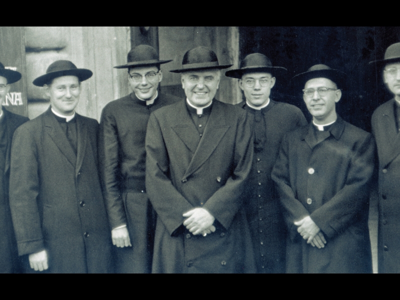Father Carl studied in Rome during Vatican II for his doctorate in theology. Here, he poses with other priests in front of the Casa Santa Maria on ’Umlta St.