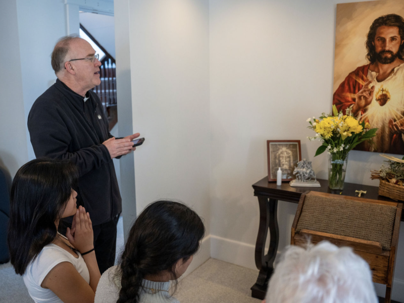 Father Ashbaugh enthrones Sacred Heart
