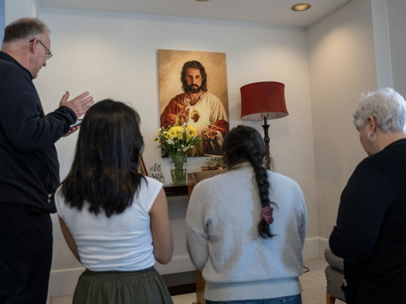 Father Ashbaugh enthrones Sacred Heart