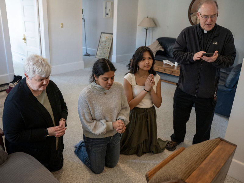 Father Ashbaugh enthrones Sacred Heart